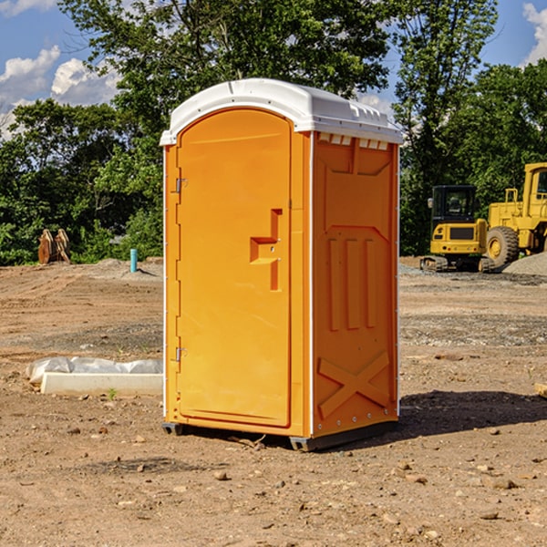 what is the cost difference between standard and deluxe portable restroom rentals in Larwill IN